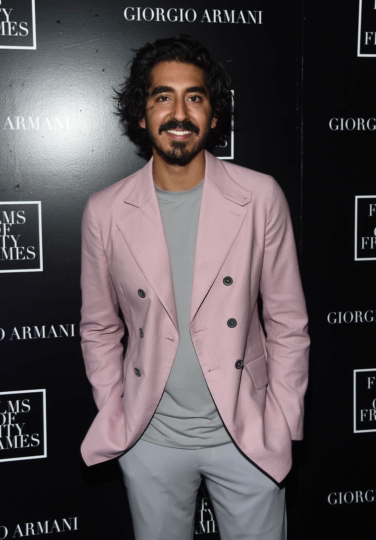 celebsofcolor: Dev Patel attends Giorgio Armani Films of City Frames Party during