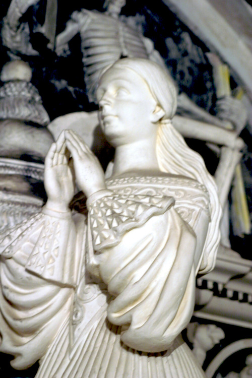 Praying statue of a man and woman from the Crypt of the sanctuary of Santa Maria de la Victoria