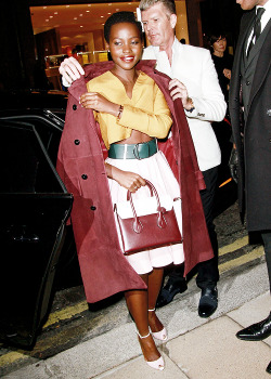 cocoaamaduah:  soulxquarian:  ikonicgif: Lupita Nyong’o at the Bally store launch on New Bond Street in London, England.  look at royalty.  DEESSE 