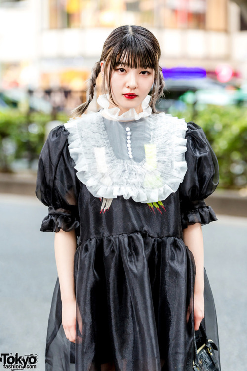 18-year-old Mami on the street in Harajuku wearing a sheer monochrome dress - with horror hands embr