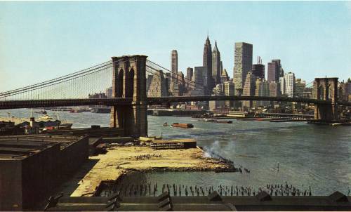 Lower Manhattan skyline and Brooklyn Bridge. View looking southwest from Manhattan Bridge’s Br