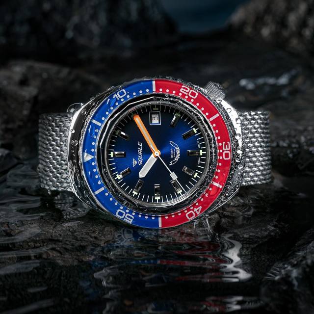 Instagram Repost 

 squaleofficial 

 Experience the fusion of style and performance with the Squale 2002 Blue-Red dive watch. Its vibrant hues and iconic design embody the spirit of adventure. Dive deeper into the world of Squale. 

 #Squale #Squale2002 #ChaseYourDepths [ #squalewatch #monsoonalgear #divewatch #toolwatch #watch ]