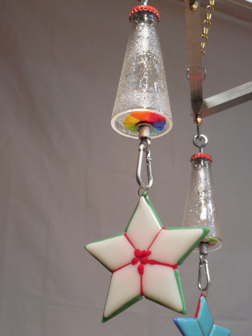 <p>Details of glass designs and some recycling at GAEL Glass. This design of the wind chime is by Piero Tosi. <br/>
<a href="Http://gaelglass.com">Http://gaelglass.com</a> <br/>
I love these delightful works of art! L. Sweeney</p>