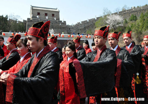  On April 11, the two came together as 21 married couples celebrated a traditional Chinese wedding c