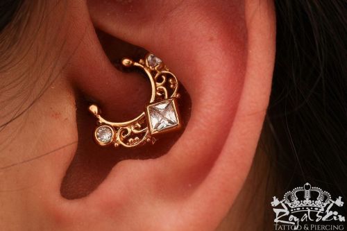 royalskinberlin:Daithpiercing with a cute oriatalic Gold stud and @swarovski crystals.  Pierced at R