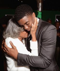 noirmujeres:  Mrs. Rachel Robinson and actor Chadwick Boseman who portrays her late husband, Jackie Robinson embrace at the Hollywood premiere of the film “42” 