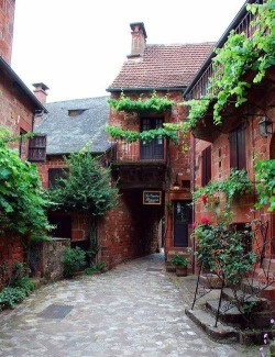 tassels:  Narrow street, Correze, France