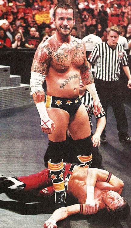 CM Punk standing over a broken lil Evan Bourne. I’m guessing Punk was to much to handle.