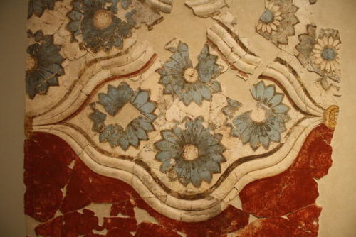 Part of a wall painting with relief ornament and painted rosettes (Akrotiri, 1600s BC).The Akrotiri 