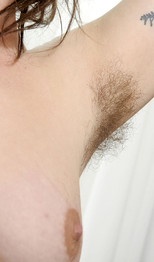 lovemywomenhairy:Just a magnificent bush to match her gorgeous pits!!!