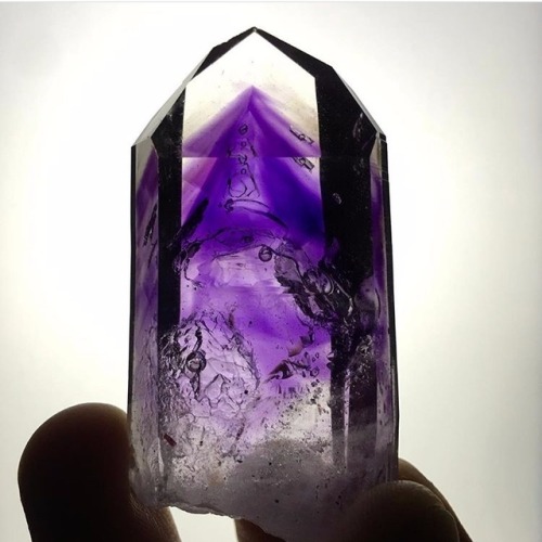 mineraliety: Smoky Amethyst with Hematite from Namibia via @skyward_eye///// www.instagram.com/miner