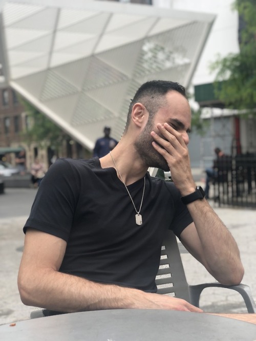 tj-593:  My friend took these photos of me cracking up in real time as he was making a joke about hot leather daddies as a couple of leather daddies passed by our table in the park. Also, look how horrible of a job portrait mode did here.