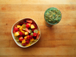garden-of-vegan:  fruit salad of green grapes, peach, strawberries, cherries, orange segments, and raspberries, and a green smoothie made with frozen banana, strawberries, spinach, spirulina powder, and soy milk 