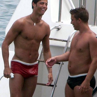 malecelebrityzone:tabloidheat101:  cristiano Ronaldo  His friend looking down like