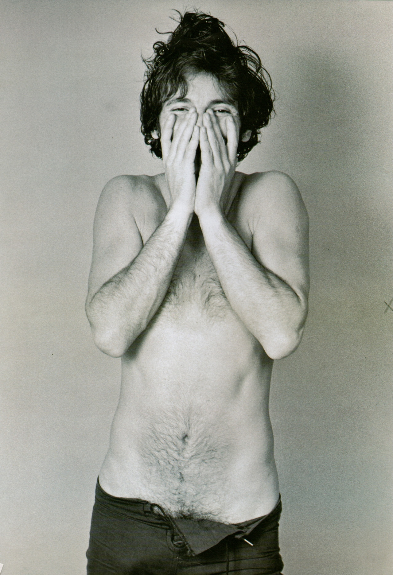 clusters along the countertop — Bruce Springsteen, NYC 1977. Photograph by  Lynn...
