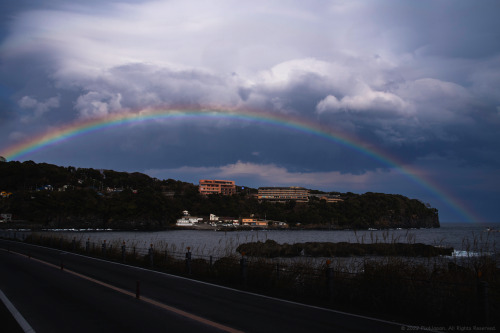 Rainbow Over Coastal ResortRoadside snapshot of a rainbow arched over the DHC Akazawa Onsen Village 