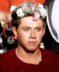 XXX  Niall looking very beautiful in his flower photo