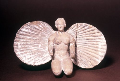 oyuvo: Terracotta figure of Aphrodite within a cockle-shell, 2nd Century BC
