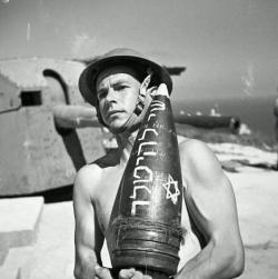 eretzyisrael:  This  image is of a man in the Jewish Brigade, a formation of the British  Army that fought the Germans in Italy in 1944. The rocket says “A gift  for Hitler&quot;The Israel Project