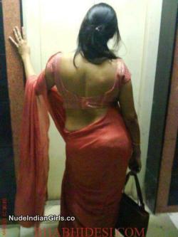 Indian Bhabhi in Red Saree Possing her Back