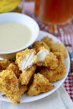 yummyinmytumbly:  Baked Popcorn Chicken with