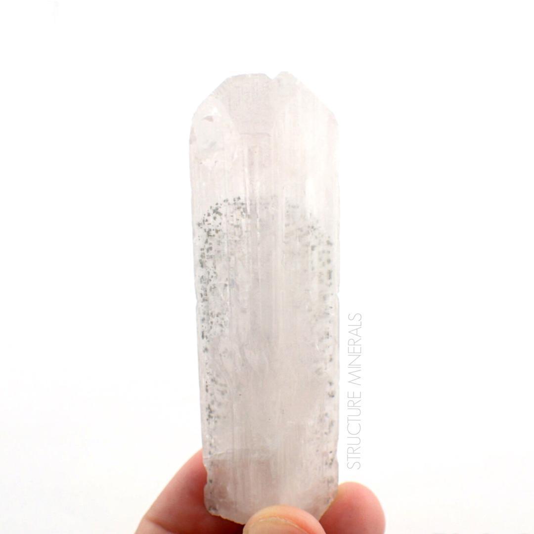 structureminerals:  Pyrite included Danburite crystal from Mexico  StructureMinerals.com