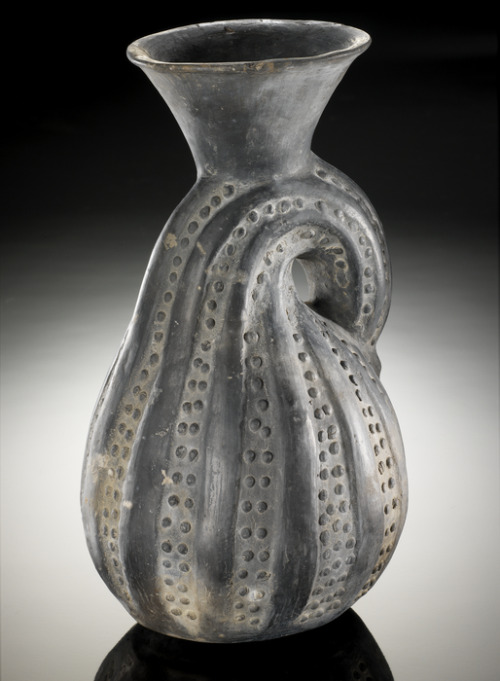 Bottle in the shape of a gourd. Chimu, pottery, circa 1200 - 1400. Courtesy of the National Museum o