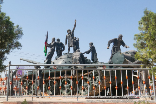 Herat Afghan Soviet Tank Memorial Statue of Afghan Nothern Alliance freedom fighters victoriously ho