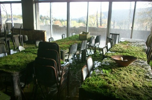 destroyed-and-abandoned:Moss coated tables in a cafeteria at an abandoned ski resort in Japan. .etha