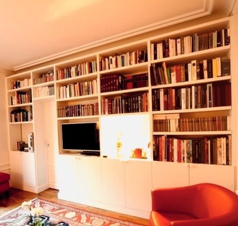 Family Room Library In ParisImage Of A Medium-sized, Modern Family Room Library With A Media Wall, White