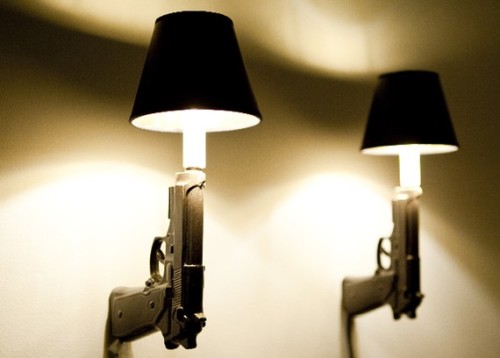 gunrunnerhell:  Loaded Objects Ceramic Need new lighting fixtures? These are ceramic lamps cast to mimic firearms. They’re a bit pricey (about 躭.00 for the AK lamp, and 跥.00 for the triple handgun lamp and 贝 for a single handgun wall lamp),
