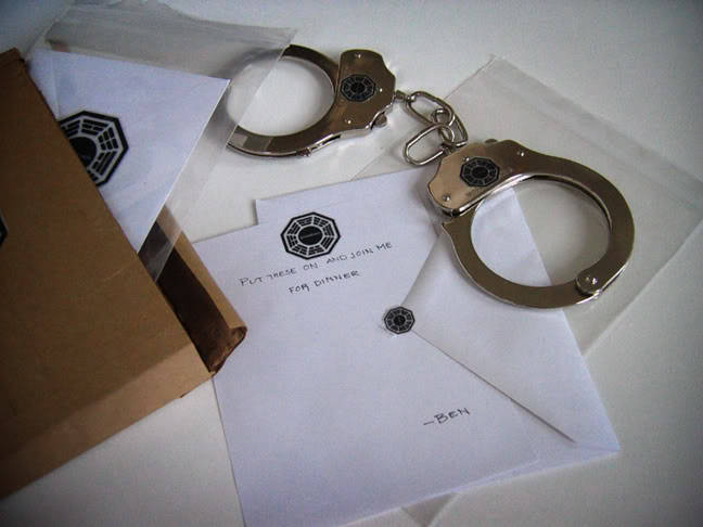 A valentine for ME, made by my friend Kate Walsh, from Benry from Lost. It features handcuffs, some Dharma paraphernalia, and a note on Dharma stationary saying "Put these on and join me for dinner. -Ben"