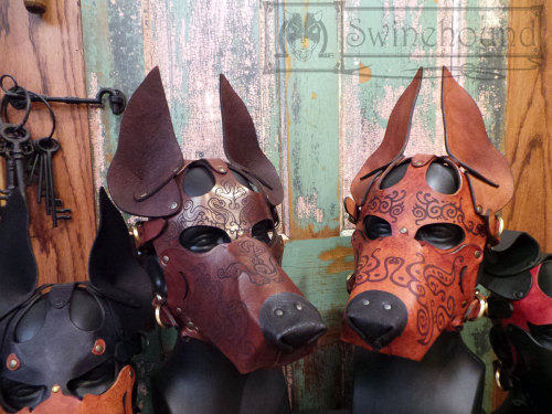 misterswinehound:  Two dog masks for the Anthrocon art show. The design engraved on these was created by my partner-in-artistic-crime over at http://bonepile.tumblr.com/.  We put the masks together.  I think they came out really great.
