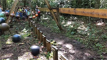 liminal-zone:  siterlas:  itscolossal:  A mesmerizing pendulum wave demonstration with 16 bowling balls in a North Carolina forest [VIDEO]  #oh god I thought this was an obstacle course for those children   #hypothetical lawsuits  