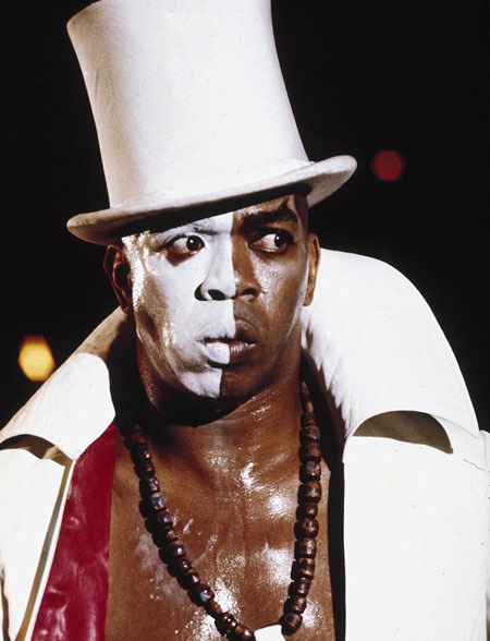 cflag:  Geoffrey Holder, the native Caribbean who played a crucial role in transforming modern theater, has passed away from pneumonia at age 84. Holder’s imposing 6’6” stature and inimitable baritone voice helped make him a highly influential figure