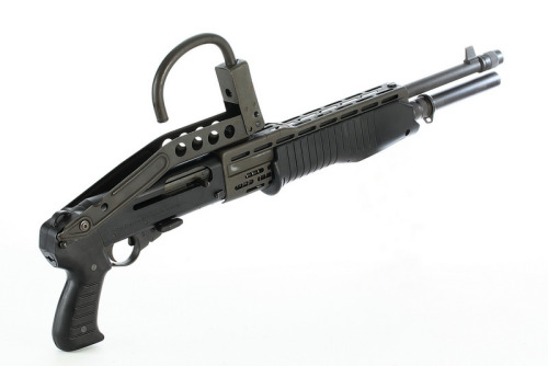 gunrunnerhell:SPAS-12One of the most distinct features of this Italian shotgun is the top-folding me
