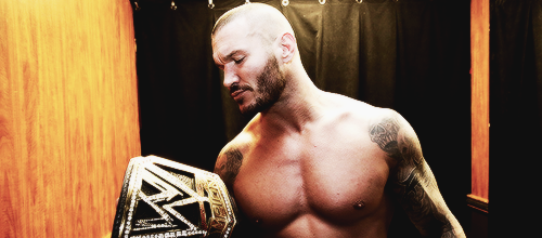 I think we are disturbing Randy and his private moment with the WWE Title!