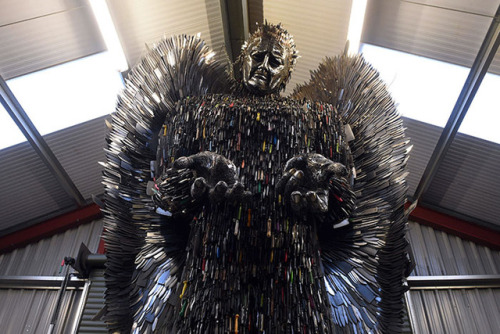 sixpenceee:   Sculptor Spends 2 Years To Build Knife Angel Out Of 100,000 Weapons  There’s a giant 26-foot-tall Knife Angel sculpture in the UK, built  entirely out of 100,000 donated knives. But besides the impressive  statistics, it’s also a monument