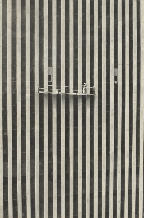 oldnewyorklandia:  Lida Moser, Two Workers, Exxon Building, 1975.            