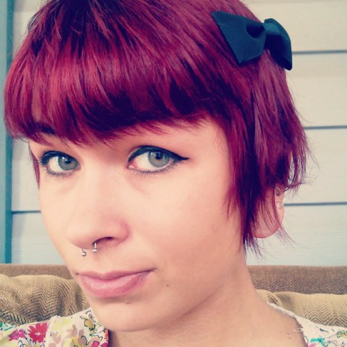 Made a new bow &amp; have a tiny little ducktail today. #eyelineronfleek #redhairdontcare