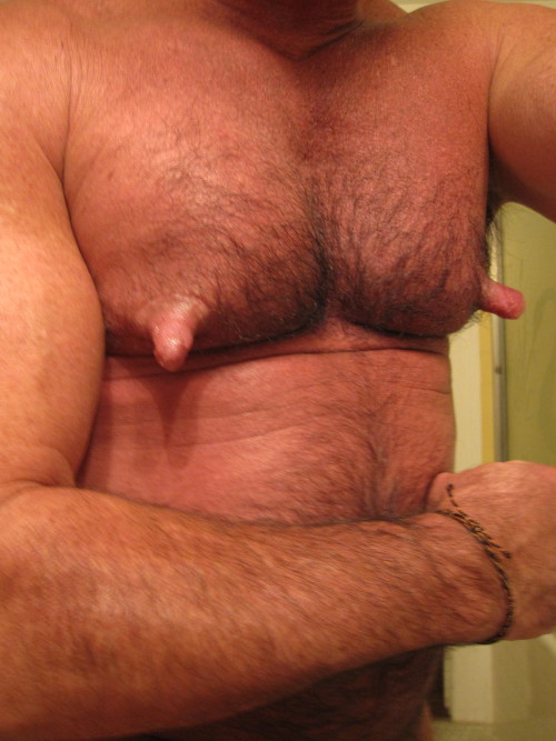 jockstrapbear:  suitedsubmissive:  His nips are about as big as my dicklet!!  He is fucking amazing!  I’d kill to have pumped nips like this…so massive and obscene that I could never hope to hide them underneath my dress shirts.  Tell tale evidence