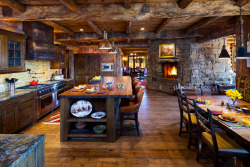 Hearthandtimber:  Stylish-Homes:  Cozy Rustic Kitchen Equipped With A Fireplace Via