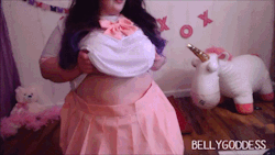 thebellygoddess:  Tentacle Schoolgirl Fuck   She’s fat, she’s cute, and she’s horny. Using her tentacle dildo, this school girl fucks herself silly. She teases you with her big ass up her pink skirt before showing you close ups of her pussy. She