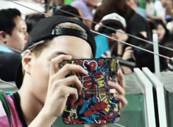 kaura-m:  Fanboy Jongin recording a soccer game ft. his spiderman phone cover 