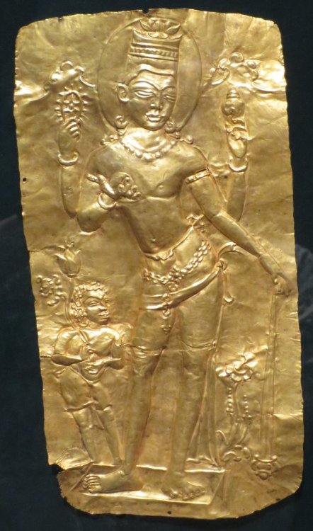 The Hindu deity Vishnu with an attendant.   Gold repoussé, from Si Thep (?), Thailand, artist unknow