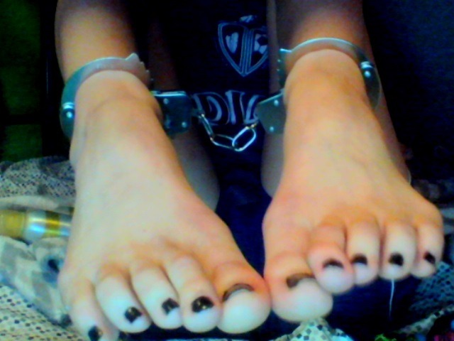 themissarcana:  Awesome locking handcuffs with keys, but shitty webcam pictures.