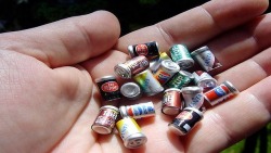 useless-cantrips: randomitemdrop:  Item: handful of tiny soda cans, each containing a few drops of pure flavor syrup; if added to a glass of water, the syrup turns it into that soda.  Imported straight from Minnisoda 