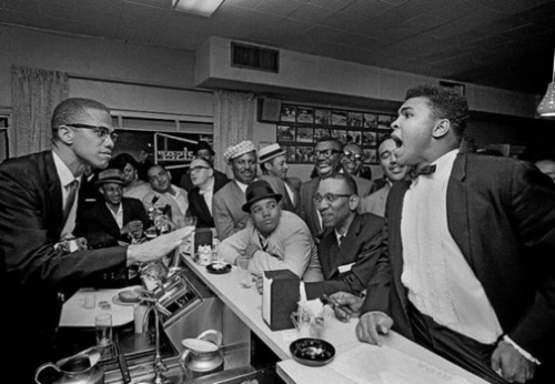 twixnmix:Muhammad Ali celebrating with Malcolm X at the Hampton House in Miami after he won the Worl