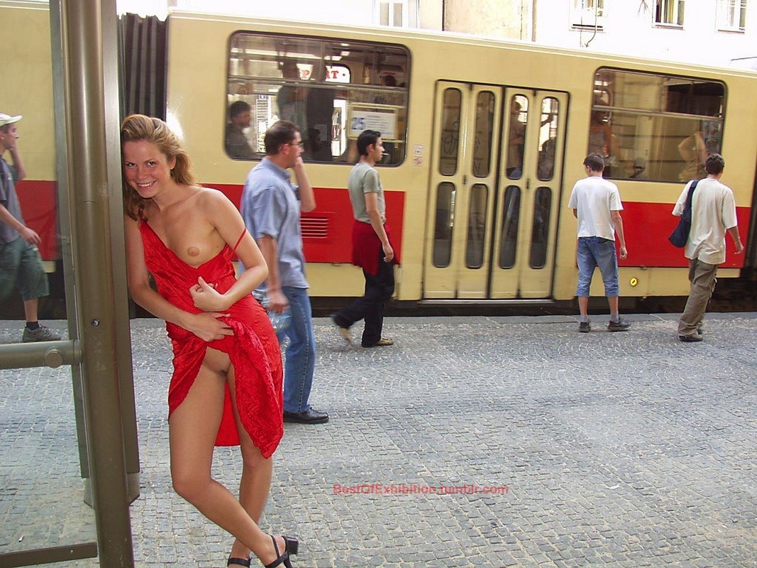 bestofexhibition:  Girlfriend showing nipple and pantyless pussy upskirt in crowded