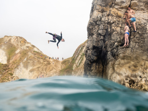 lomokev: Cliff jumpers at Durdle Door, Dorset, UK. Shame about the lack of blue sky after weeks of s